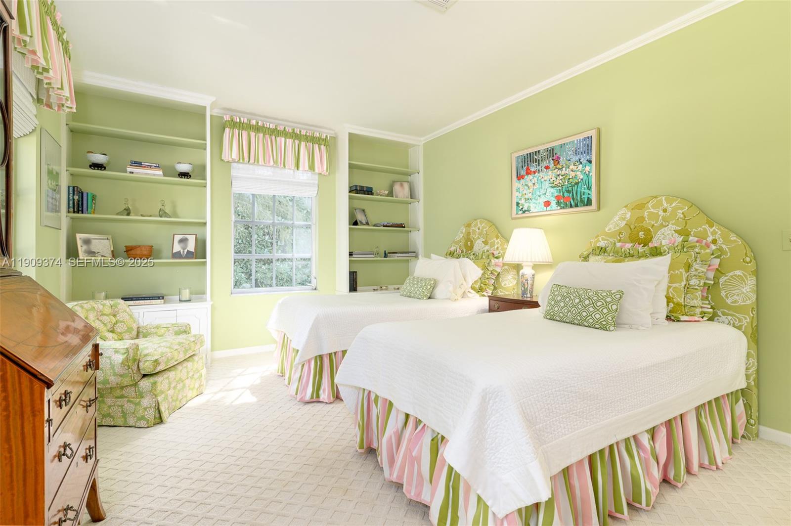 18 Gomez Road Jupiter Island, FL 33455 - Photo 18 of 34 a bedroom with a bed and a large window