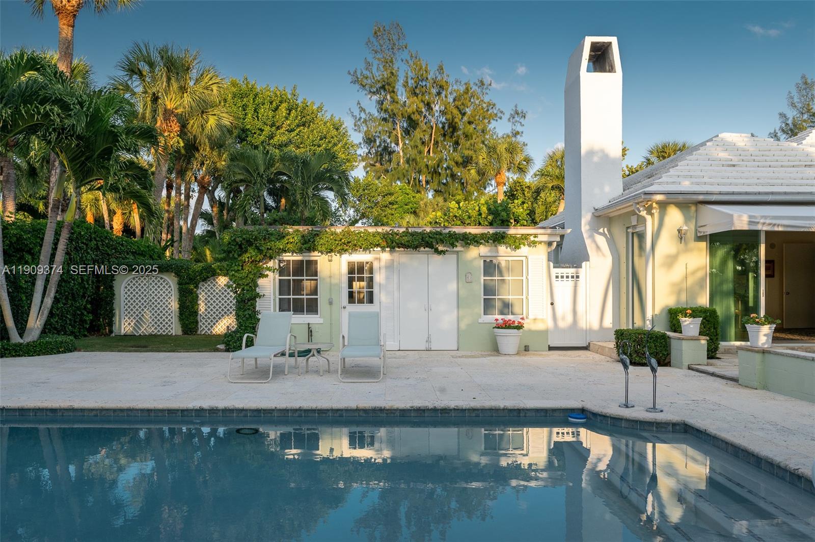 18 Gomez Road Jupiter Island, FL 33455 - Photo 22 of 34 a view of a house with a swimming pool