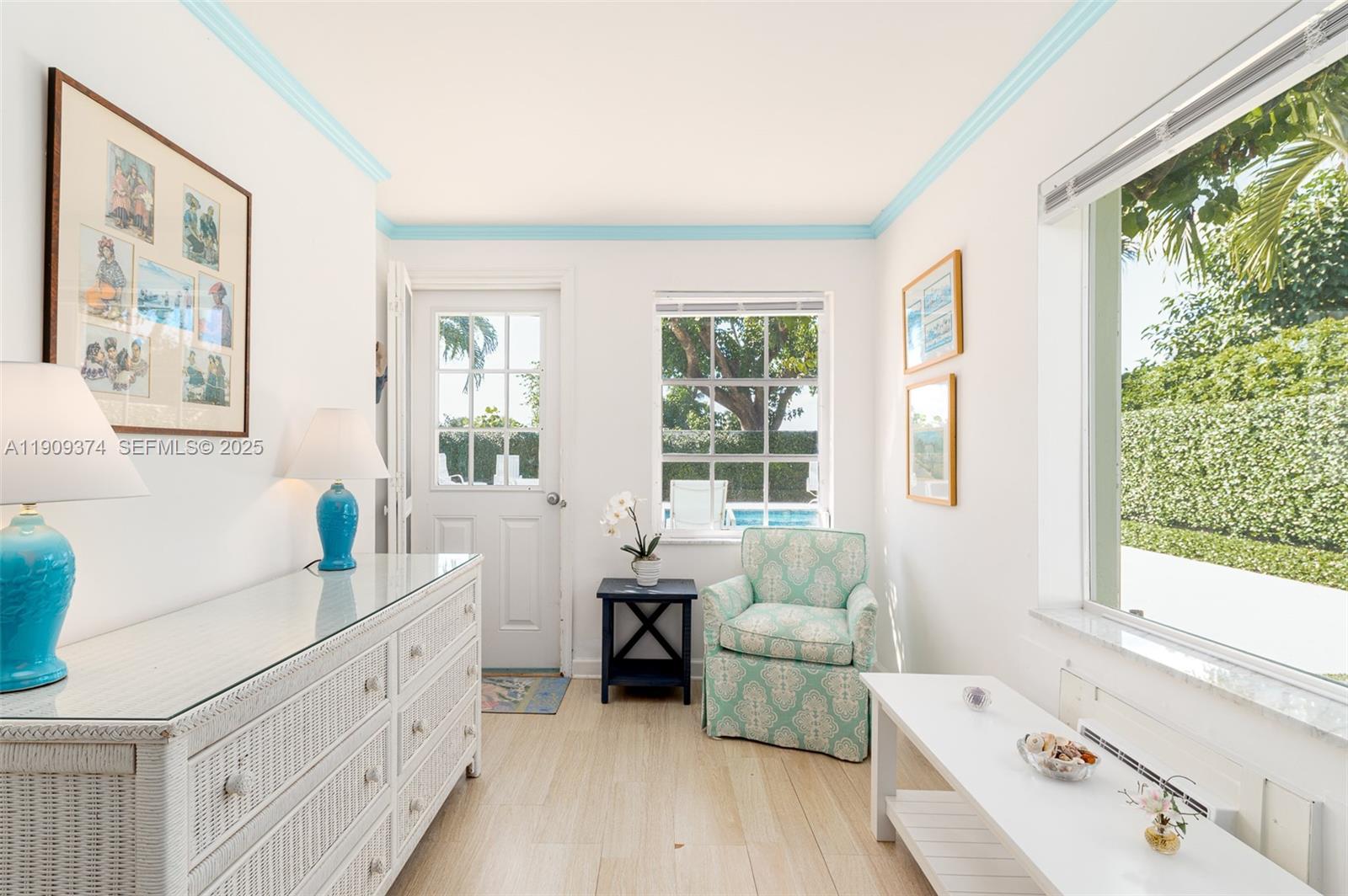 18 Gomez Road Jupiter Island, FL 33455 - Photo 23 of 34 a kitchen with sink cabinets and wooden floor