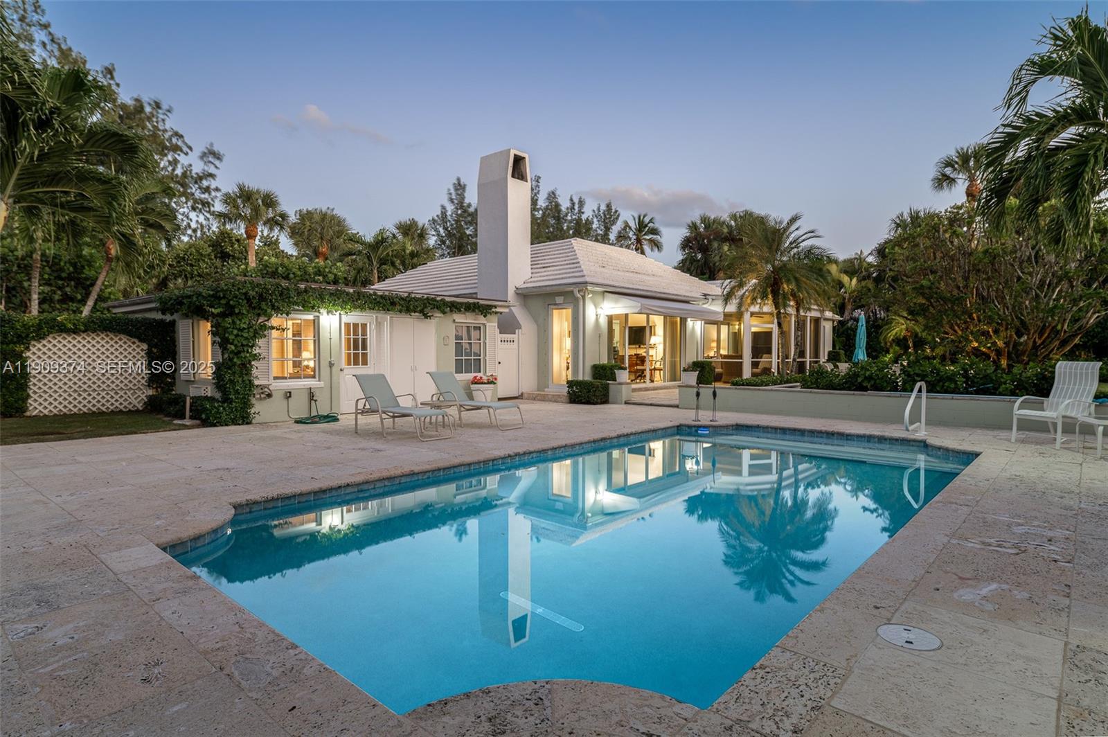 18 Gomez Road Jupiter Island, FL 33455 - Photo 26 of 34 a view of a swimming pool with a patio