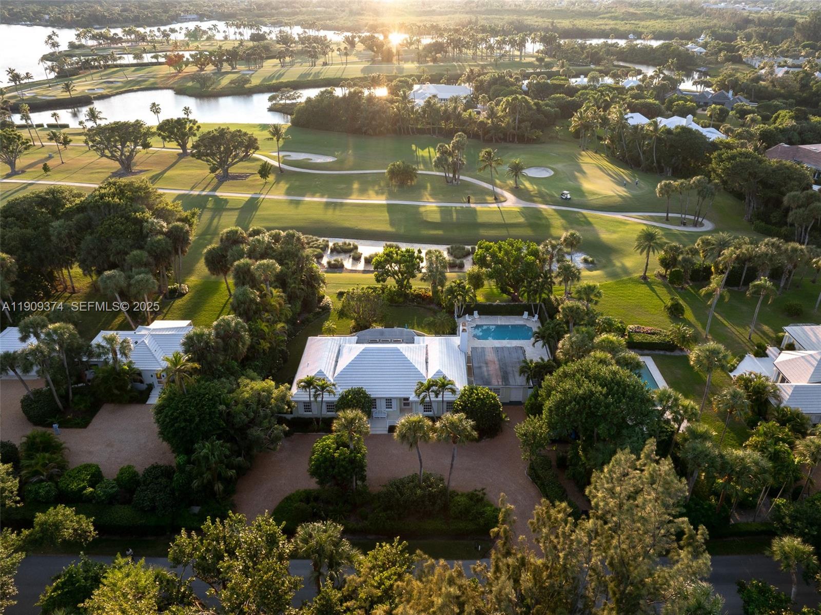18 Gomez Road Jupiter Island, FL 33455 - Photo 29 of 34 an aerial view of residential houses with outdoor space and trees