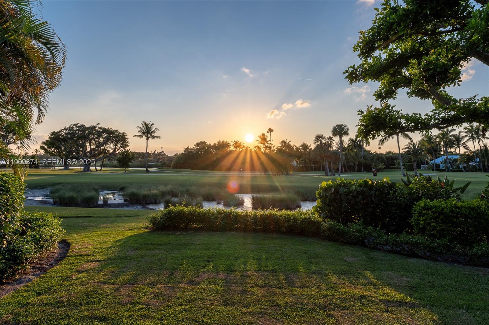 18 Gomez Road Jupiter Island, FL 33455 - Photo 4 of 34 a view of a lake with houses in the back
