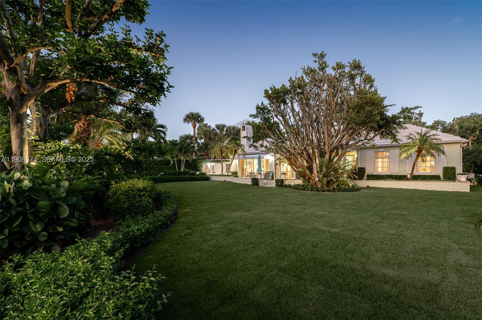 18 Gomez Road Jupiter Island, FL 33455 - Photo 6 of 34 a view of a trees in a yard