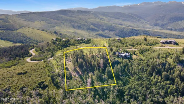 a view of a house with a mountain