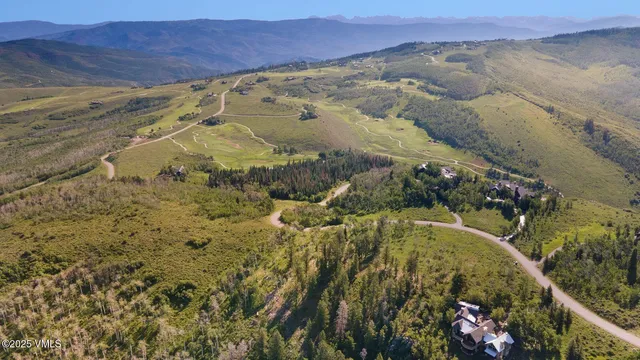 a view of a lake with a mountain