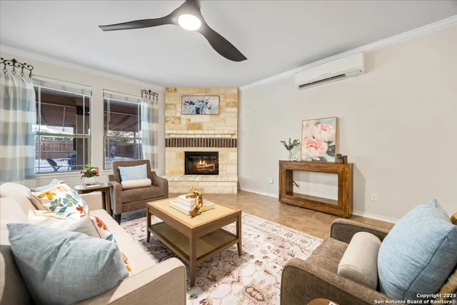 a kitchen with kitchen island granite countertop a sink and cabinets