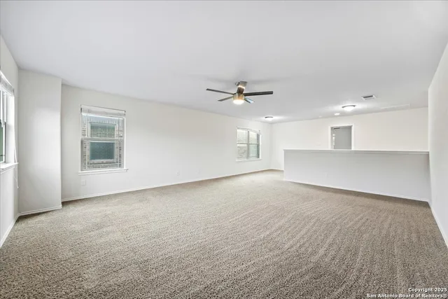 a bed room with a bed and a chandelier