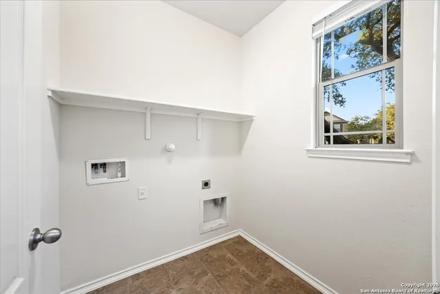 a bathroom with a sink vanity and mirror
