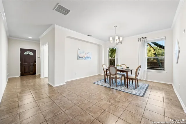 a view of a dining room with furniture