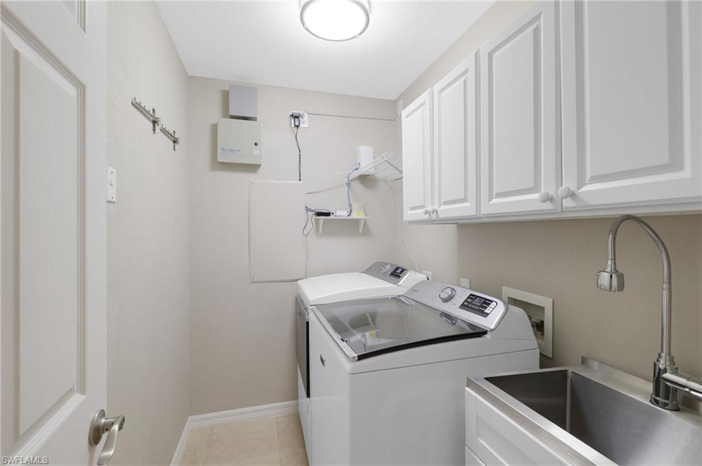 17959 Modena Road Miromar Lakes, FL 33913 - Photo 24 of 48 a utility room with sink dryer and washer