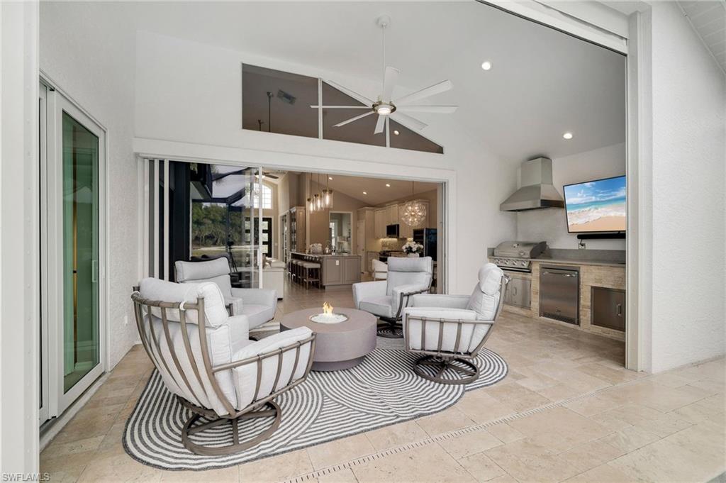17959 Modena Road Miromar Lakes, FL 33913 - Photo 29 of 48 a dining room with furniture and wooden floor