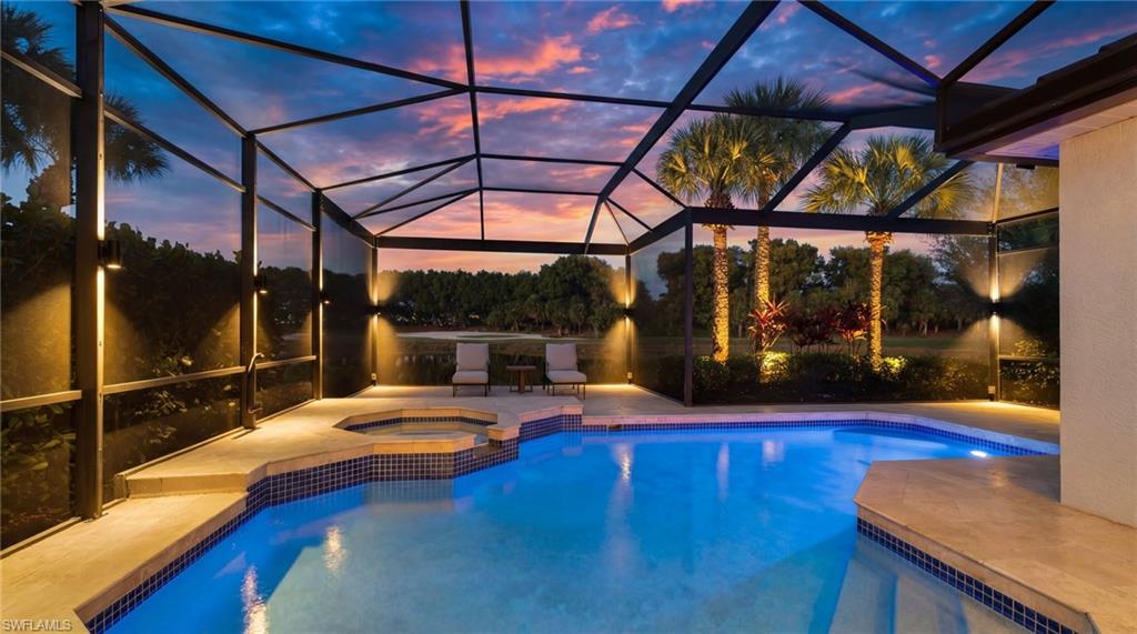 17959 Modena Road Miromar Lakes, FL 33913 - Photo 32 of 48 a view of swimming pool with a patio