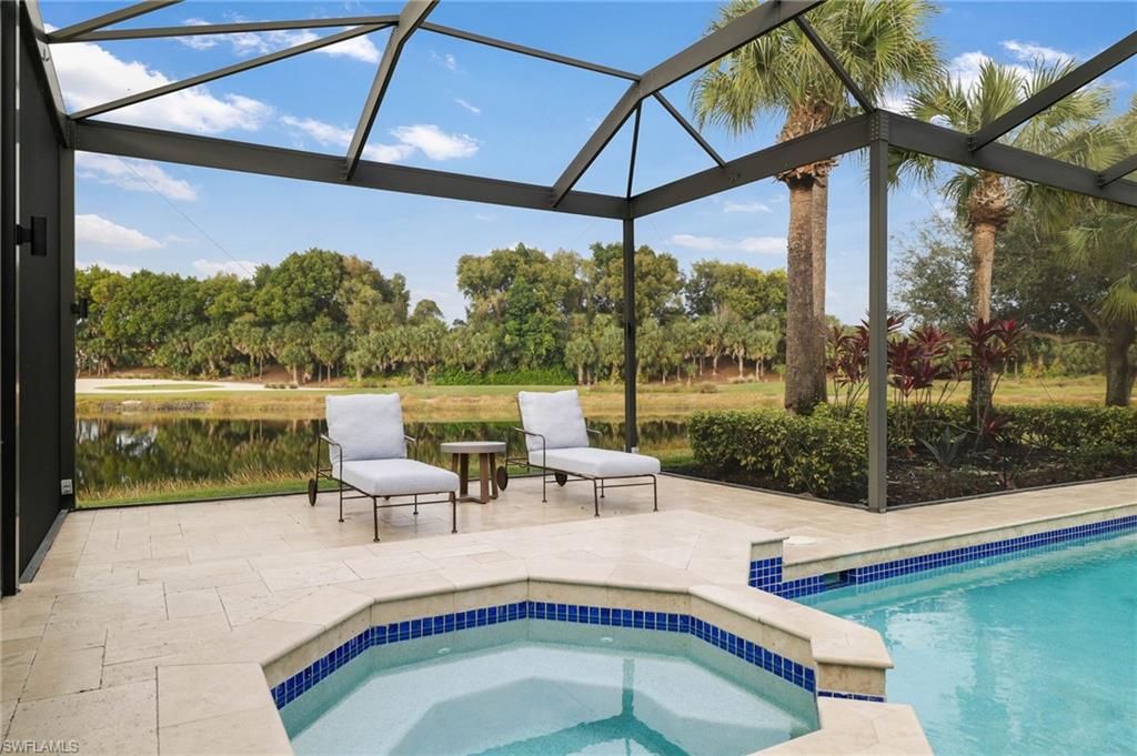 17959 Modena Road Miromar Lakes, FL 33913 - Photo 34 of 48 a view of swimming pool with patio