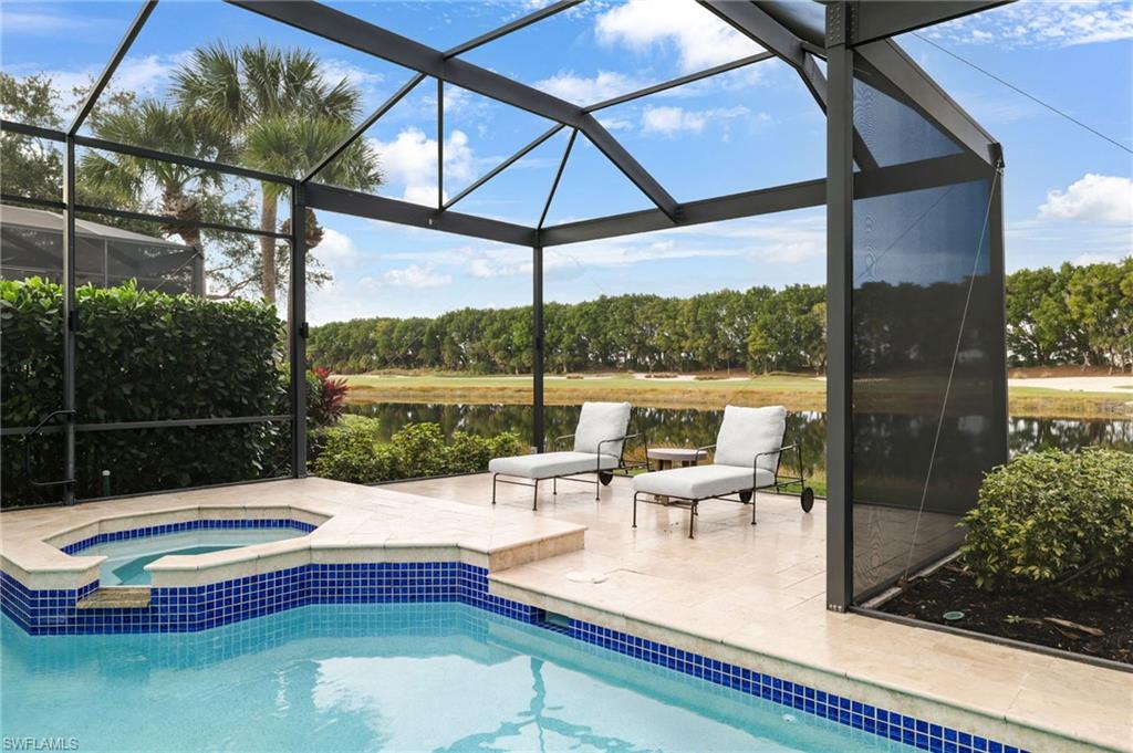 17959 Modena Road Miromar Lakes, FL 33913 - Photo 35 of 48 a view of swimming pool with a patio