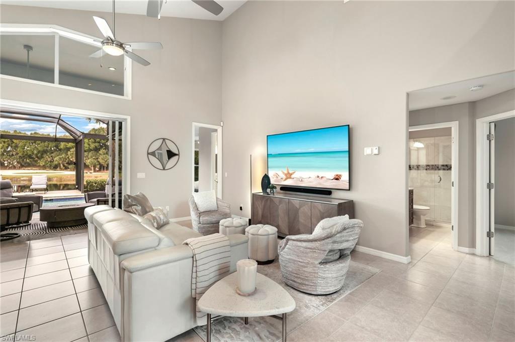 17959 Modena Road Miromar Lakes, FL 33913 - Photo 6 of 48 a living room with furniture and a large window