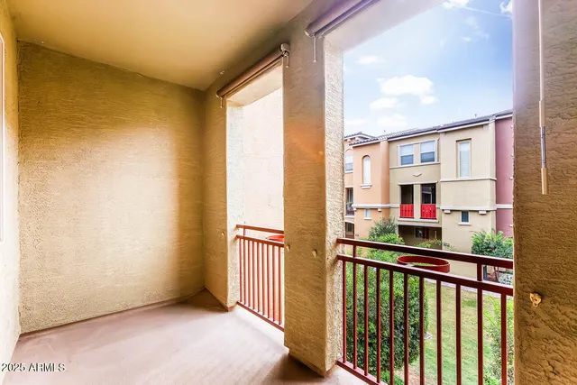 a view of a balcony with an outdoor space