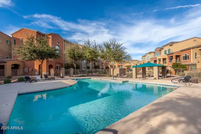 a view of a lake with a building in the background