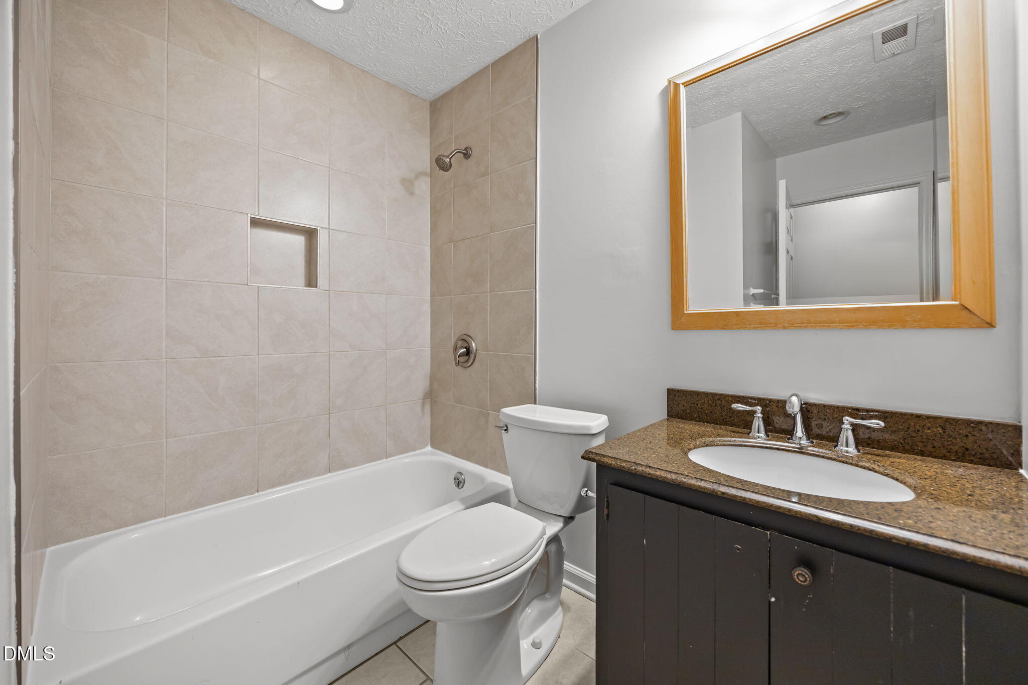 3333 Jo Anne Drive Raleigh, NC 27603 - Photo 14 of 24 a bathroom with a sink a toilet and shower