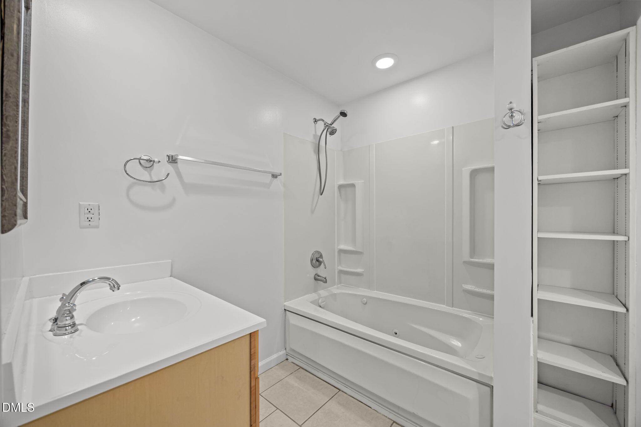 3333 Jo Anne Drive Raleigh, NC 27603 - Photo 17 of 24 a bathroom with a sink a toilet and shower