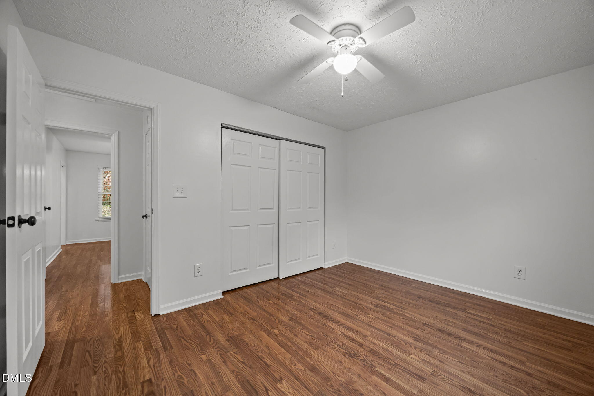 3333 Jo Anne Drive Raleigh, NC 27603 - Photo 20 of 24 wooden floor in an empty room with a window