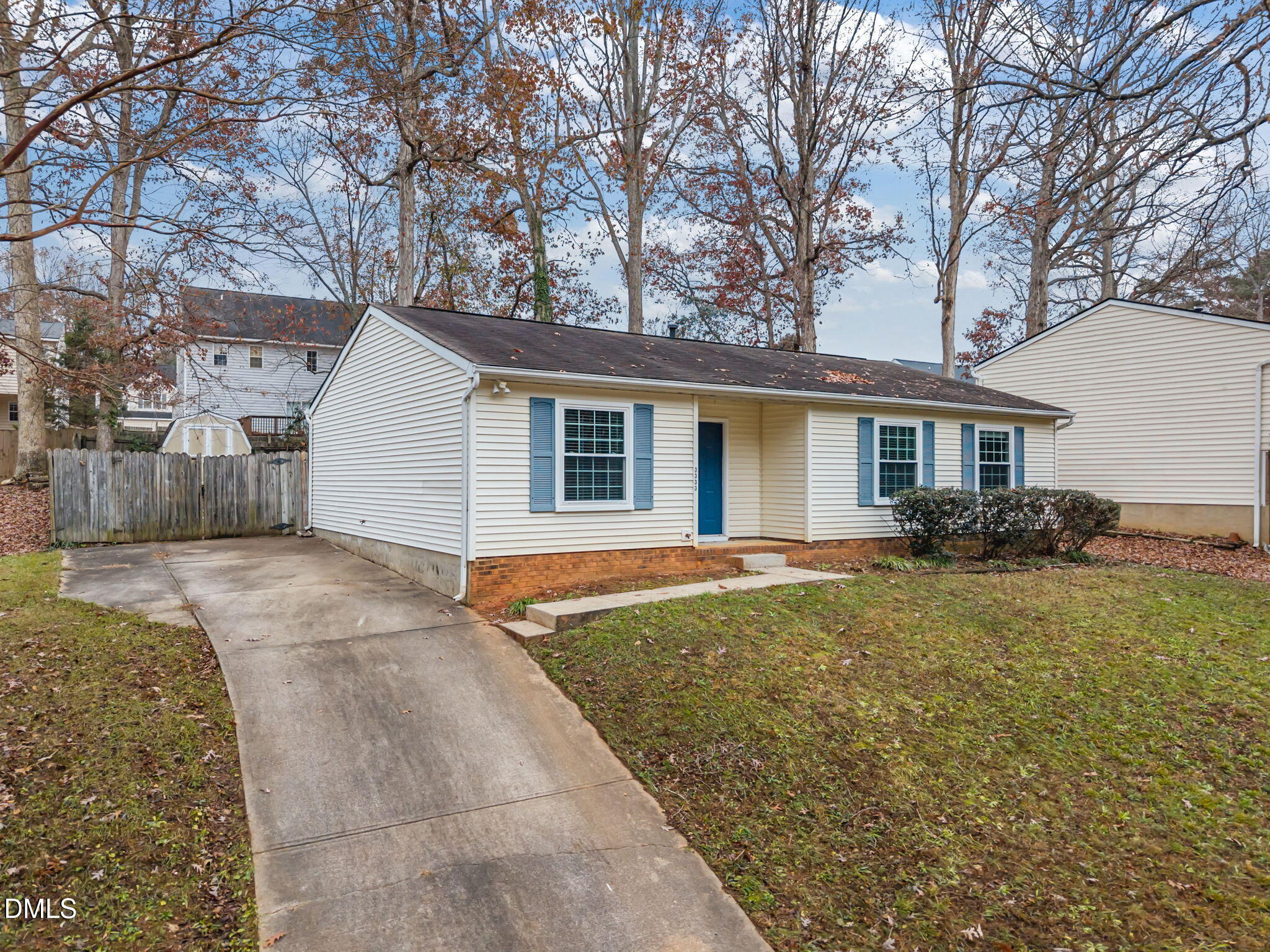 3333 Jo Anne Drive Raleigh, NC 27603 - Photo 2 of 24 a view of backyard of house with large trees