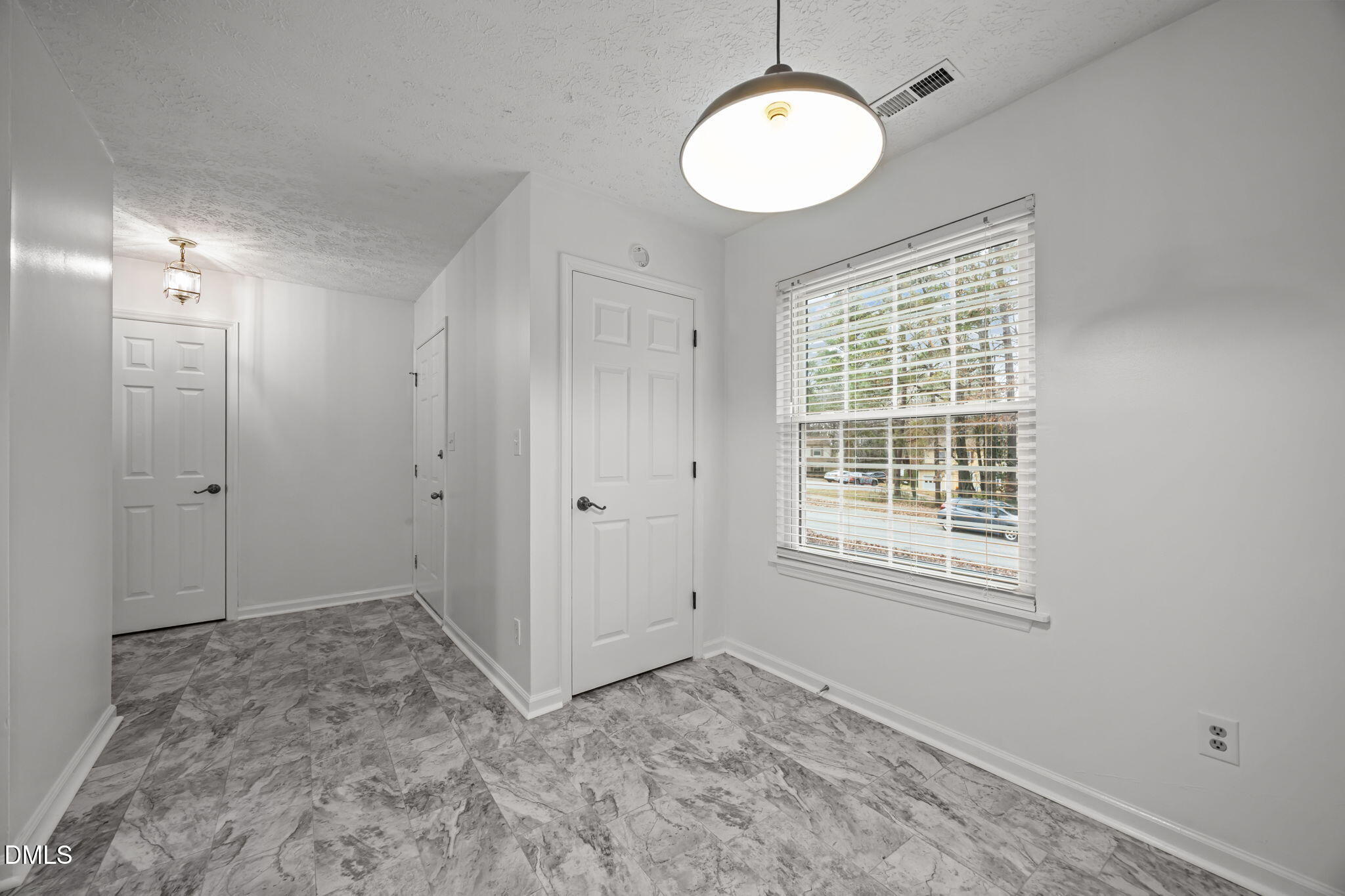 3333 Jo Anne Drive Raleigh, NC 27603 - Photo 7 of 24 a view of an empty room with a window