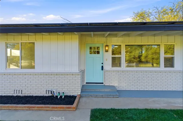 a view of swimming pool with outdoor seating