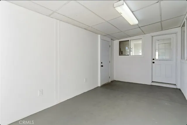 a view of a house with a tree