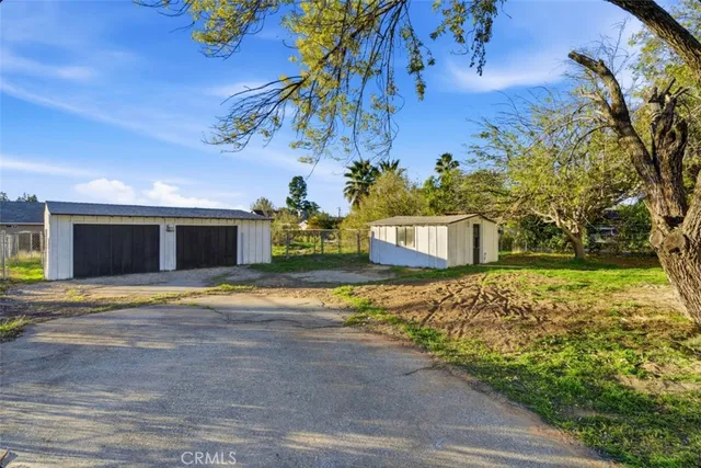 an aerial view of a house with a garden