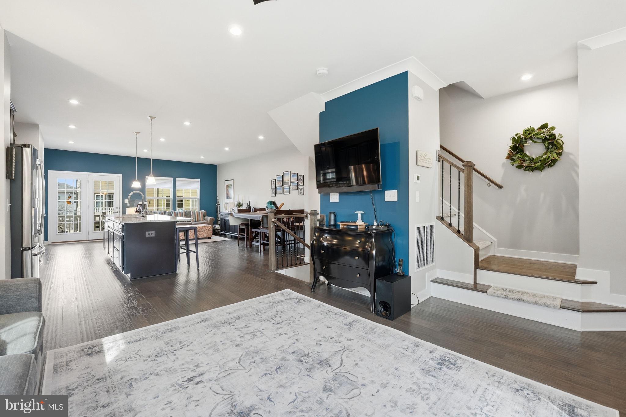 18112 Red Cedar Road Dumfries, VA 22026 - Photo 17 of 69 a living room with fireplace furniture and a flat screen tv