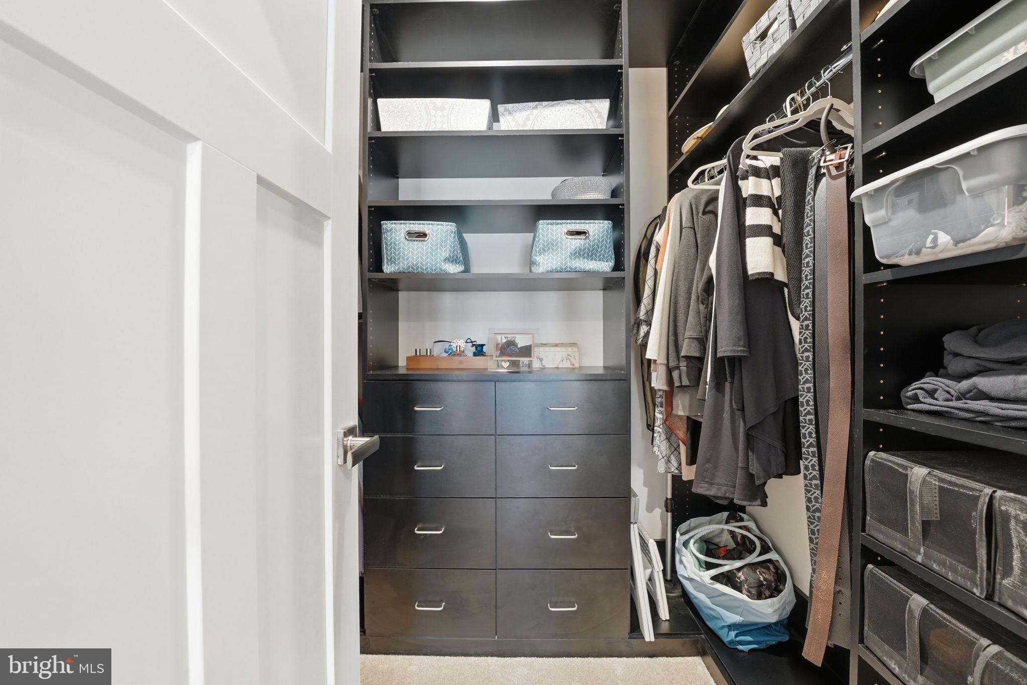 18112 Red Cedar Road Dumfries, VA 22026 - Photo 23 of 69 a view of walk in closet with clothes and shoes