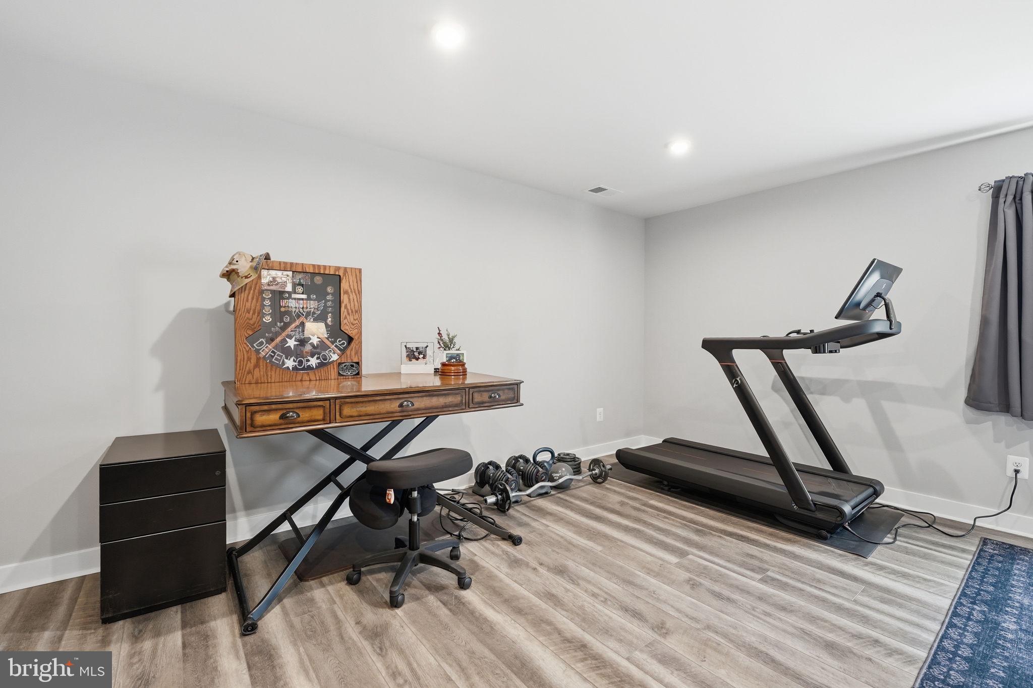 18112 Red Cedar Road Dumfries, VA 22026 - Photo 35 of 69 a view of workspace with gym equipment