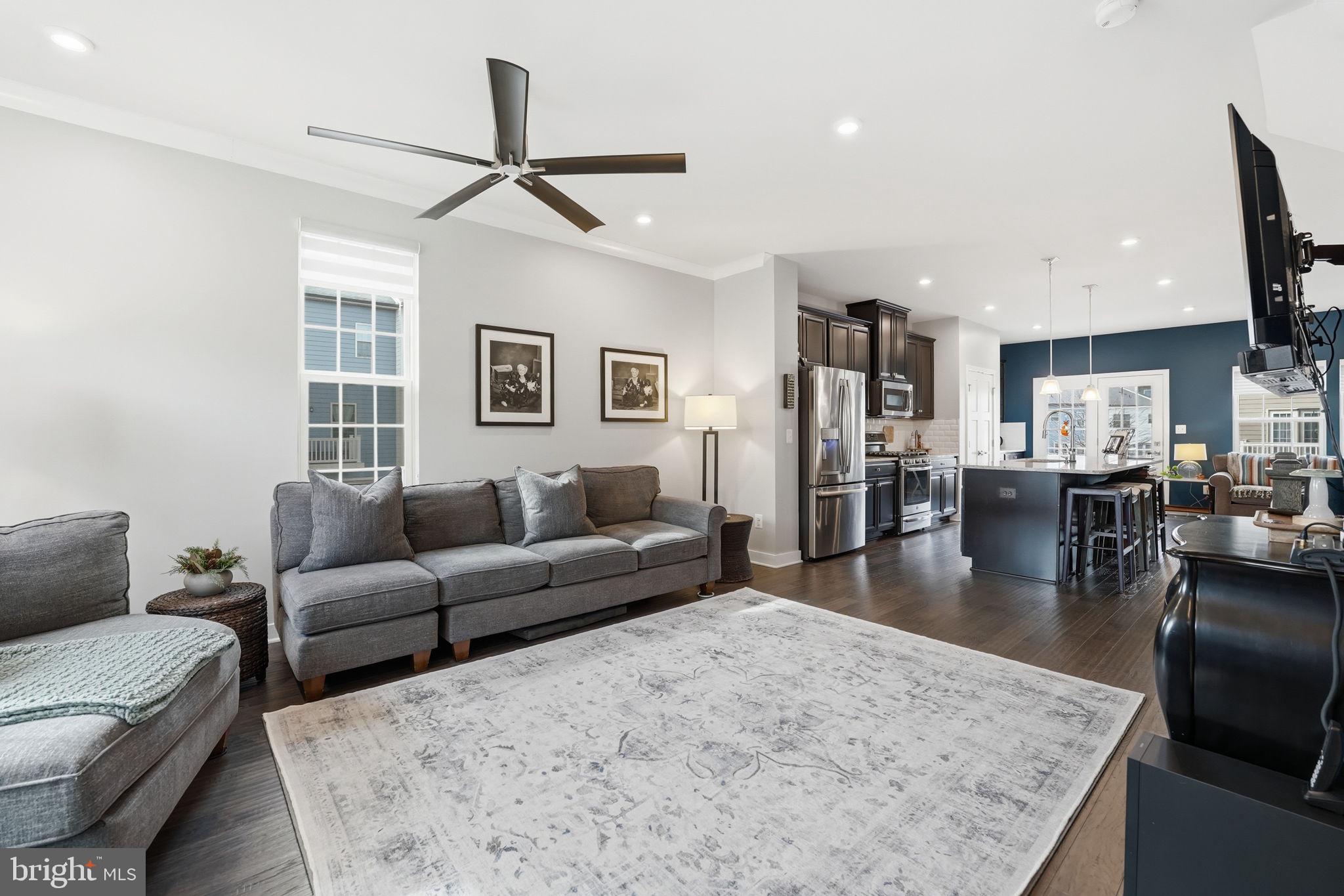 18112 Red Cedar Road Dumfries, VA 22026 - Photo 4 of 69 a living room with furniture and a table