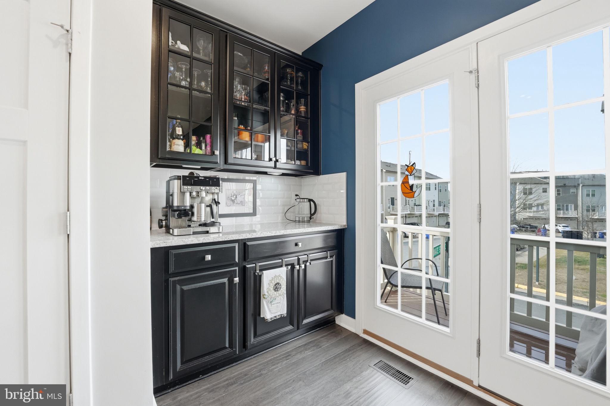 18112 Red Cedar Road Dumfries, VA 22026 - Photo 8 of 69 a kitchen with granite countertop a stove and a sink