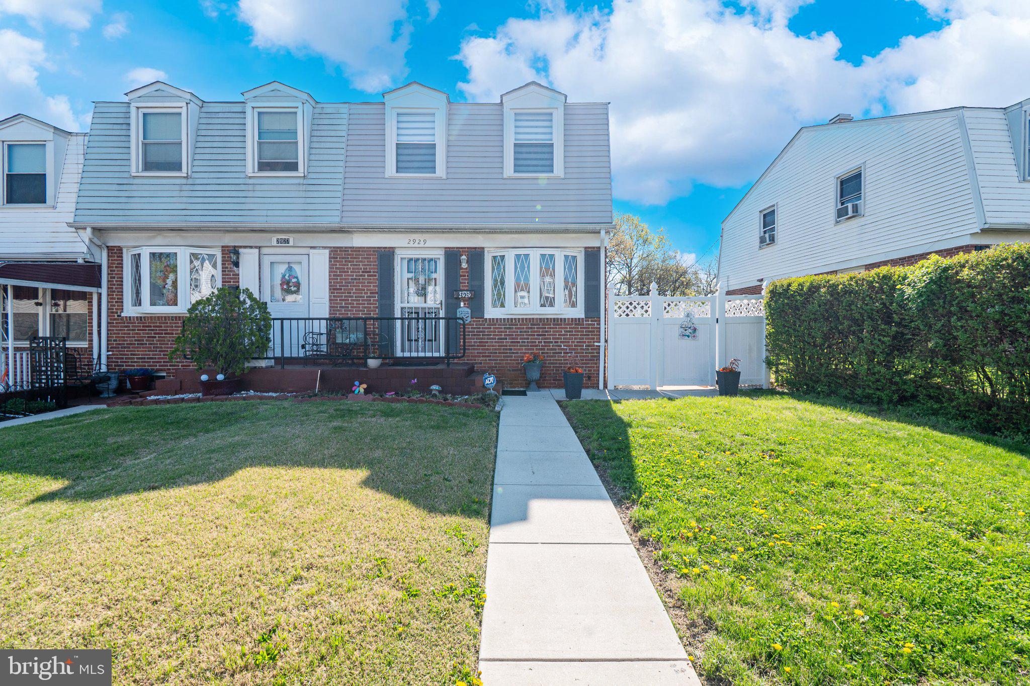 Charming duplex with inviting curb appeal.