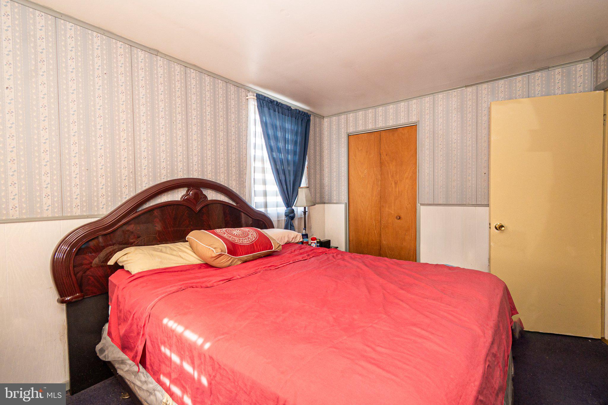 2929 Mallview Road Baltimore, MD 21230 - Photo 14 of 35 Cozy bedroom with warm hues and charm.