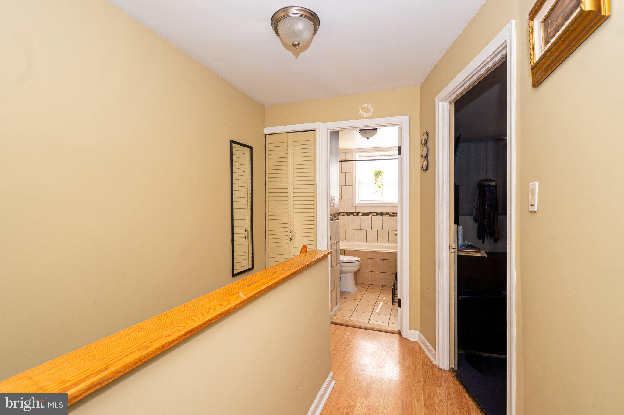 2929 Mallview Road Baltimore, MD 21230 - Photo 15 of 35 Inviting hallway with warm tones.