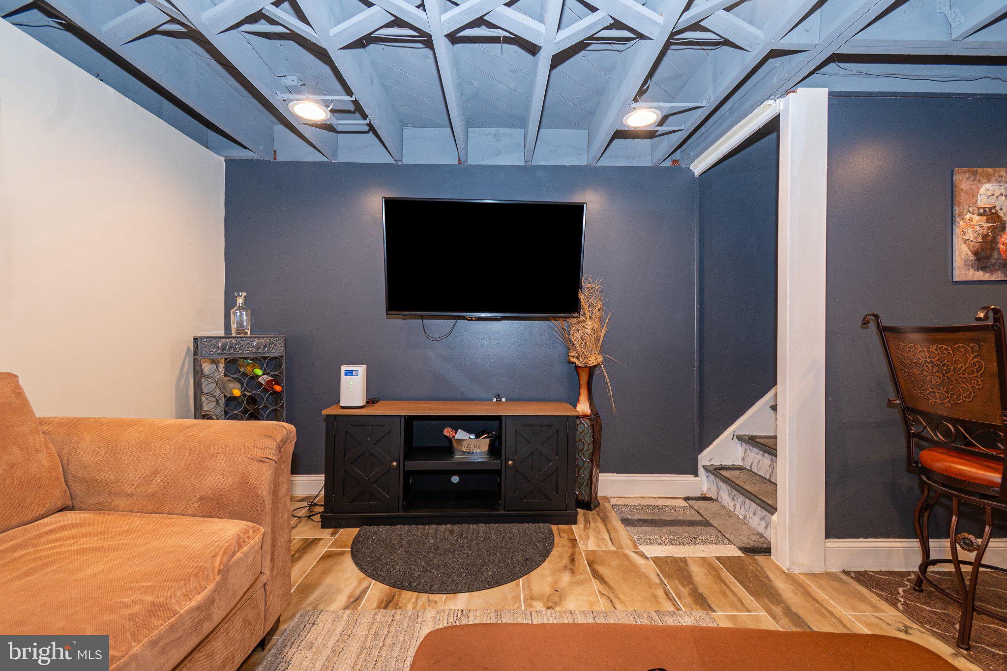 2929 Mallview Road Baltimore, MD 21230 - Photo 19 of 35 Cozy basement retreat with modern flair.