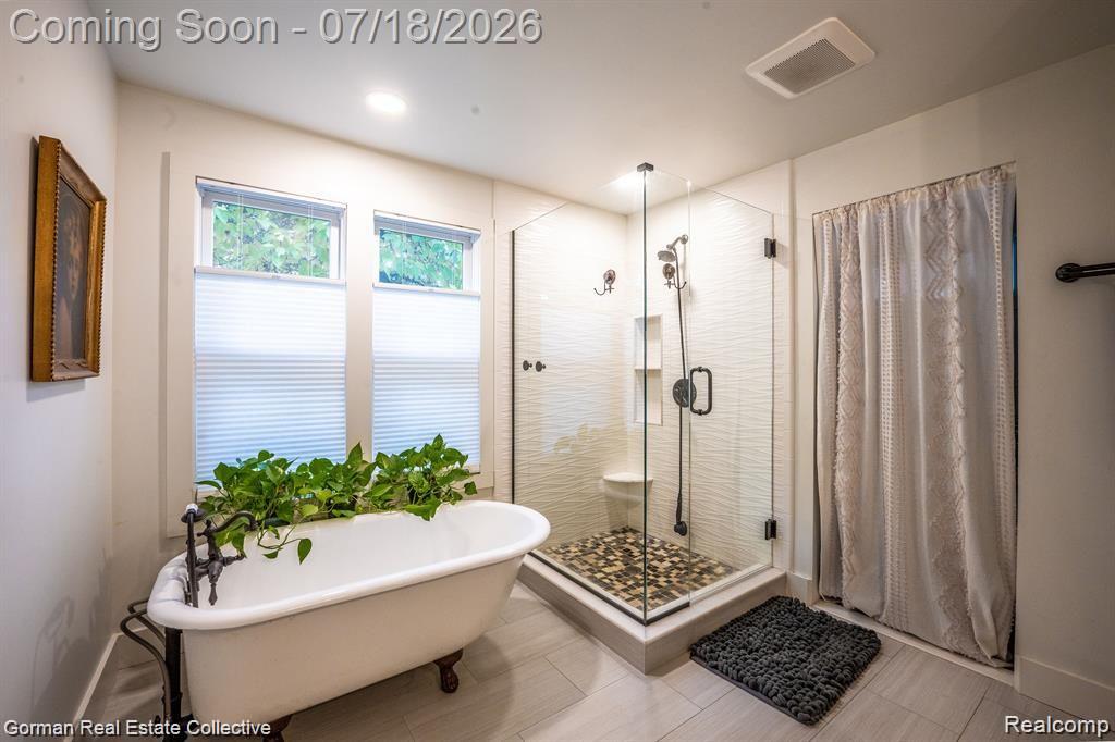 283 Phillips Avenue Clawson, MI 48017 - Photo 14 of 26 1800's cast iron tub reglazed, custom tiled shower, huge walk in closet
