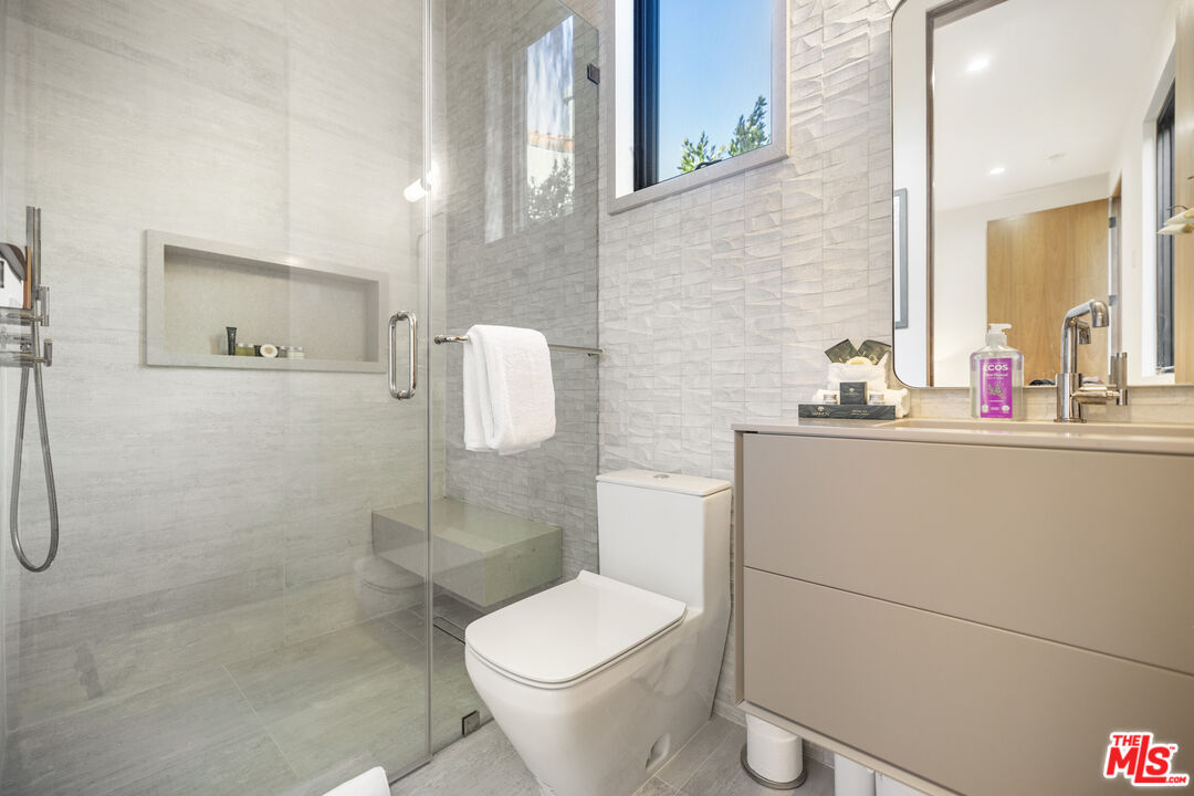 4246 Levitt Lane Sherman Oaks, CA 91403 - Photo 45 of 63 a bathroom with a toilet sink and shower