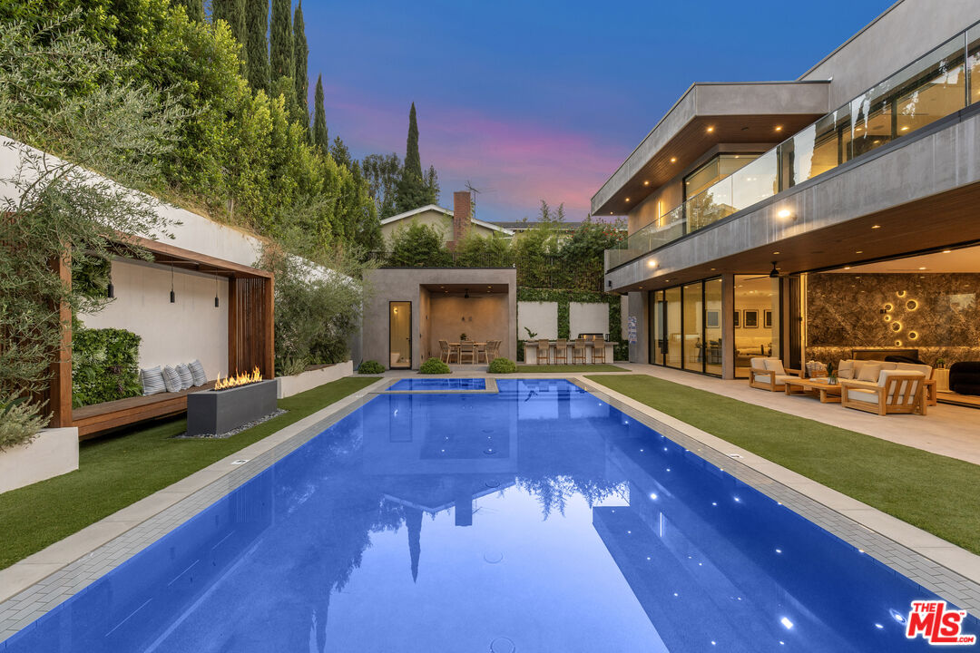4246 Levitt Lane Sherman Oaks, CA 91403 - Photo 55 of 63 a view of a house with pool and sitting area