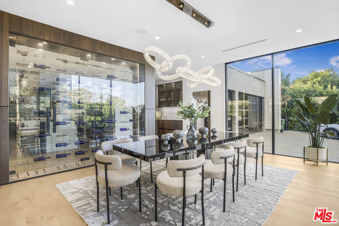 4246 Levitt Lane Sherman Oaks, CA 91403 - Photo 6 of 63 a view of a dining room with furniture window and outside view