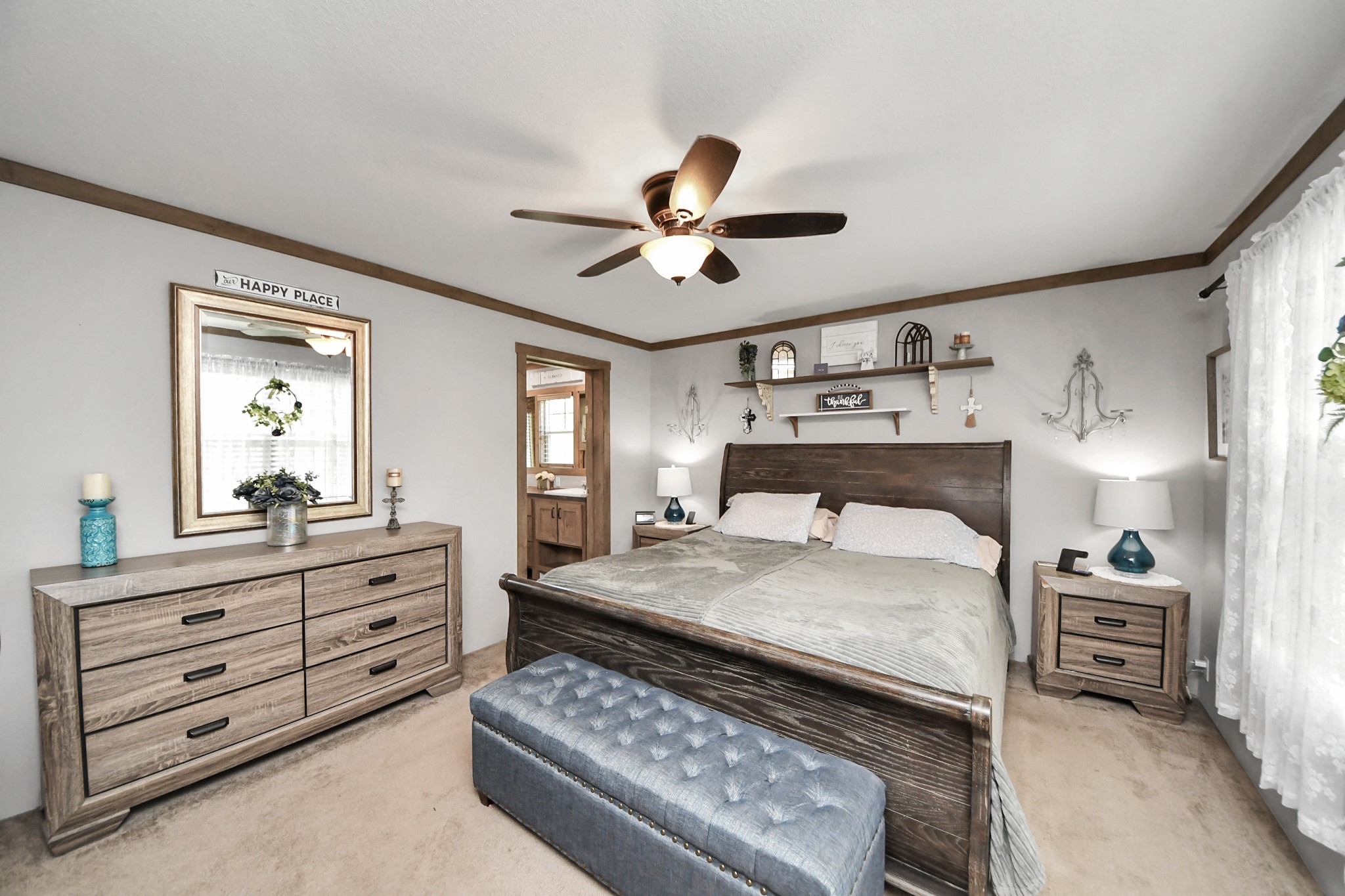 131 Kiowa Court Rosharon, TX 77583 - Photo 17 of 42 This cozy primary bedroom features soft carpet, neutral walls, and a walk in closet. The window allows plenty of natural light