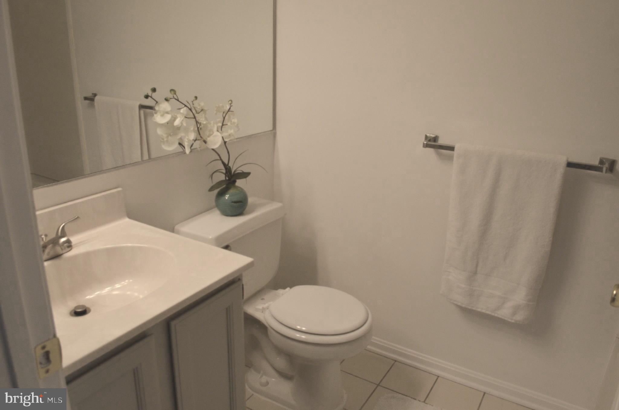 2137 Wainwright Court, Unit 2D Frederick, MD 21702 - Photo 23 of 31 a bathroom with a sink a toilet and shower
