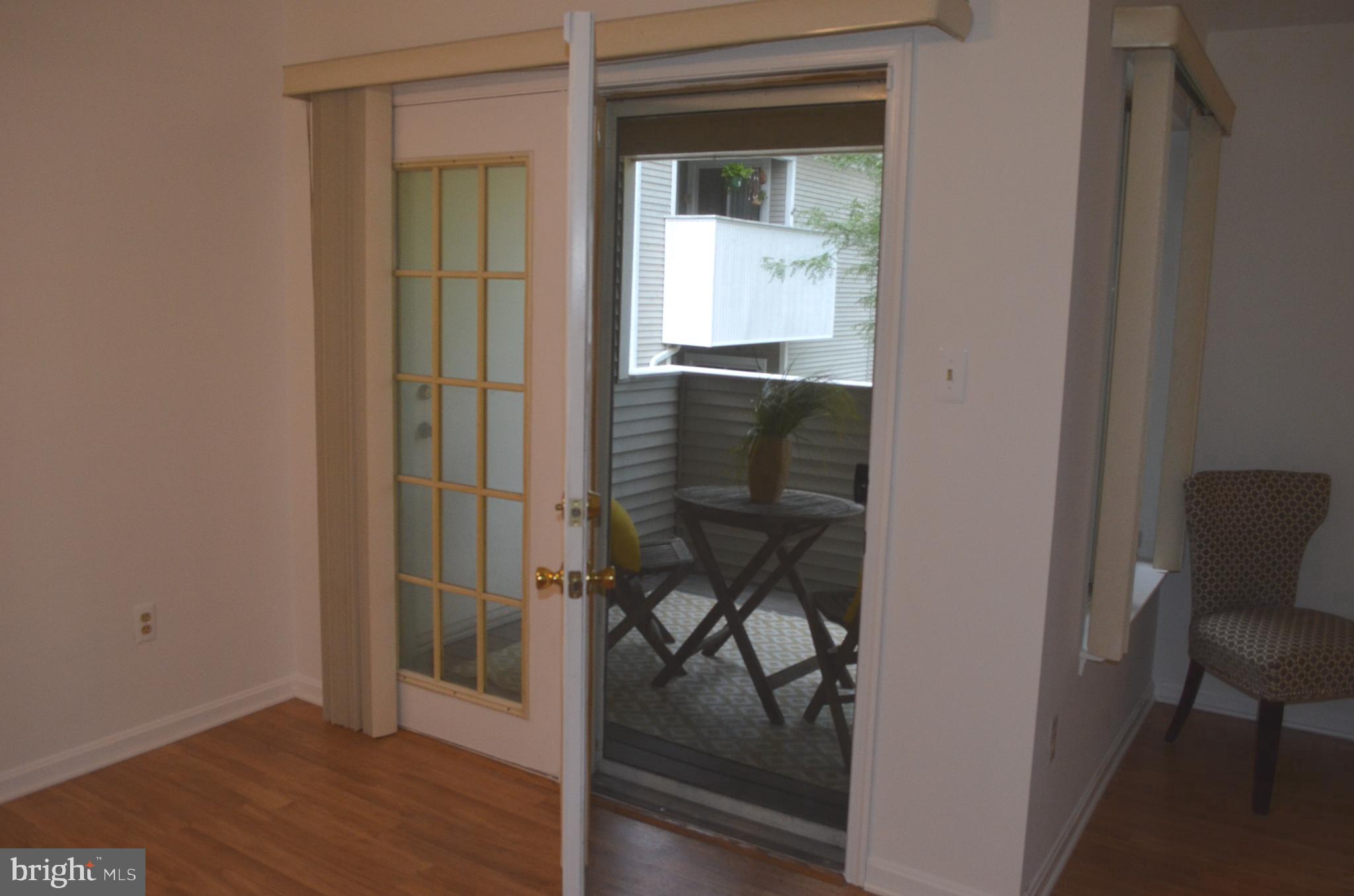 2137 Wainwright Court, Unit 2D Frederick, MD 21702 - Photo 5 of 31 a view of a hallway and wooden floor