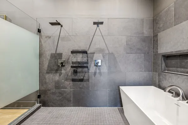 a bathroom with a sink and shower