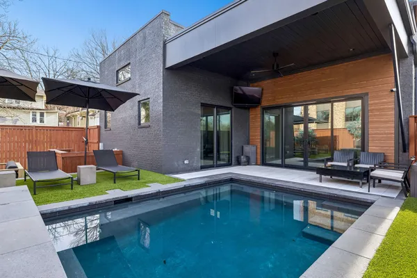 a living room with furniture and a yard