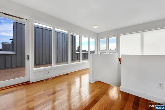 a view of balcony with seating space