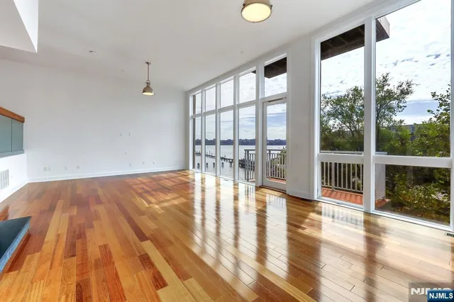 a bedroom with a bed and a fireplace