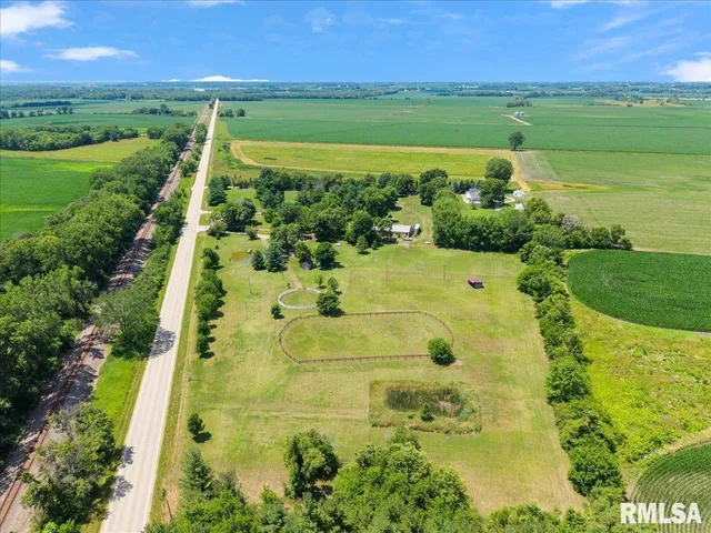 a view of a swimming pool with a yard